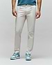 Mens Maverick 10k Step Pant, light beige, slim fit, smooth premium fabric, with a small embroidered green Psycho Bunny skull logo on the right front pocket.