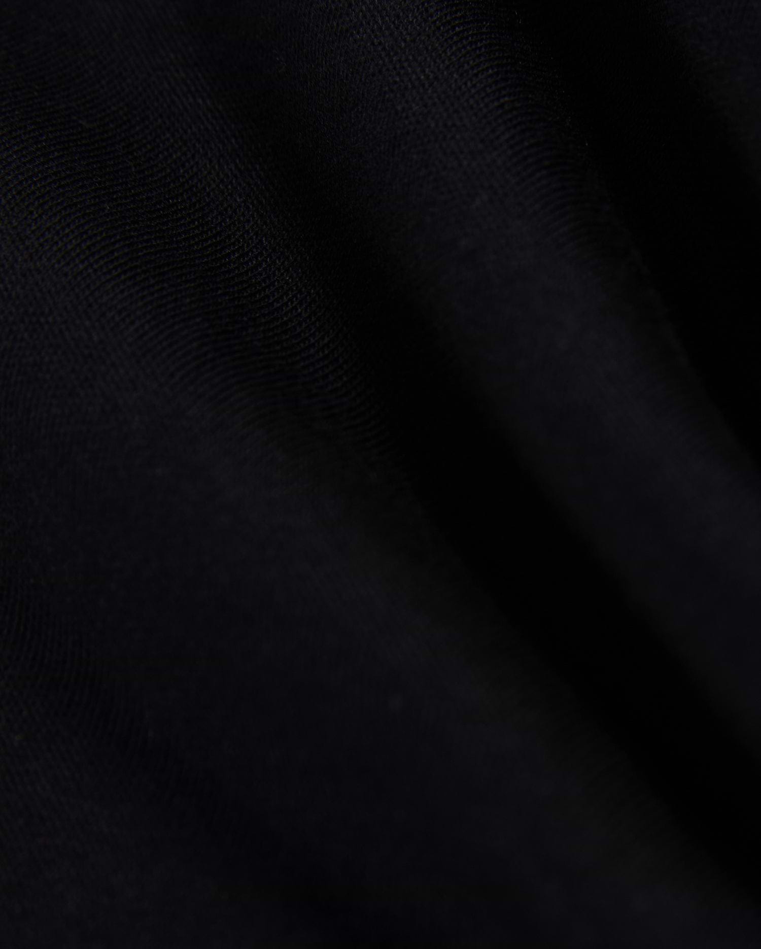 Black Mens Los Angeles Fleece Sweatshirt, a premium streetwear piece with a soft, visible fleece texture. Features the iconic embroidered Psycho Bunny skull logo, typically on the chest.