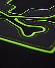 Mens Los Angeles Fleece Sweatshirt in black, featuring a large, raised neon green outline of the iconic Psycho Bunny skull logo with intricate black stitching details on the soft fleece fabric.