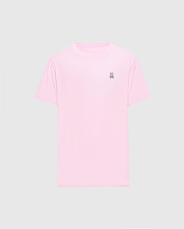 The light pink Men's Classic Crew Neck Tee (B6U014CRPC) by Psycho Bunny is crafted from soft pima cotton with a small embroidered peace sign hand symbol on the top left chest against a plain gray background, making it versatile and stylish for any casual occasion.