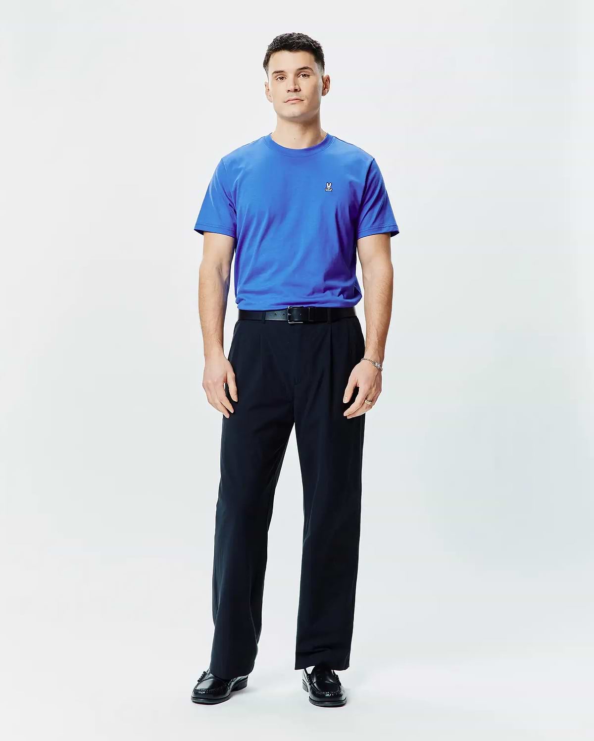 Mens Classic Crew Neck Tee in vibrant royal blue, featuring a classic fit and smooth jersey knit fabric, with a small embroidered Psycho Bunny skull logo on the left chest.
