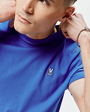 Mens Classic Crew Neck Tee in royal blue, featuring a classic fit and smooth jersey fabric. Small embroidered Psycho Bunny skull logo with pink ears and white crossbones on the left chest.
