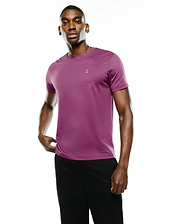 Mens Classic Crew Neck Tee in plum purple, a soft jersey knit with a classic fit, featuring a small embroidered Psycho Bunny skull logo on the left chest with white, black, and pink details.