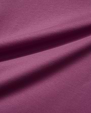Mens Classic Crew Neck Tee in a luxurious, soft plum-colored jersey knit fabric, featuring subtle folds that highlight its smooth texture and rich, vibrant hue, embodying premium Psycho Bunny style.