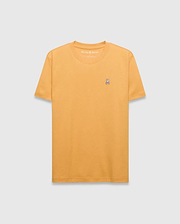 Mens Classic Crew Neck Tee in mustard yellow, featuring a classic fit and smooth jersey fabric. Small embroidered pink, white, and black Psycho Bunny skull logo on the left chest.