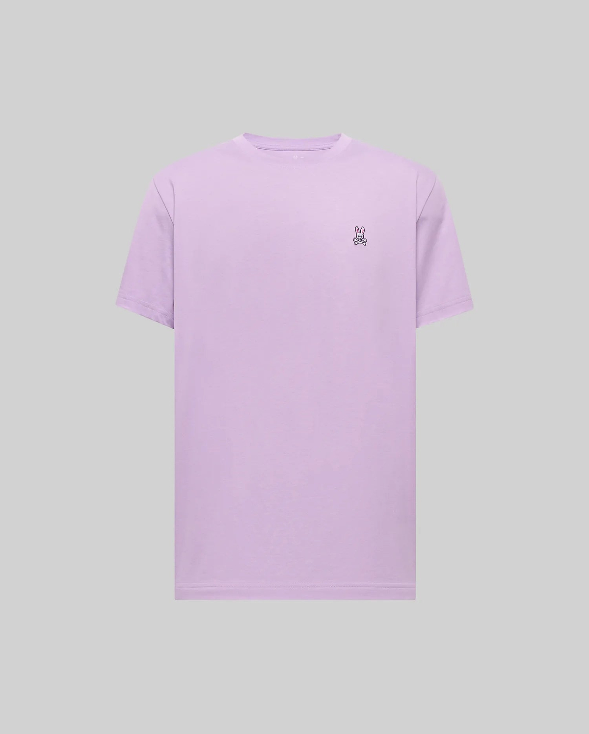 Mens Classic Crew Neck Tee in soft lavender jersey knit, featuring a comfortable classic fit and a small, intricately embroidered black, white, and pink Psycho Bunny skull logo on the left chest.