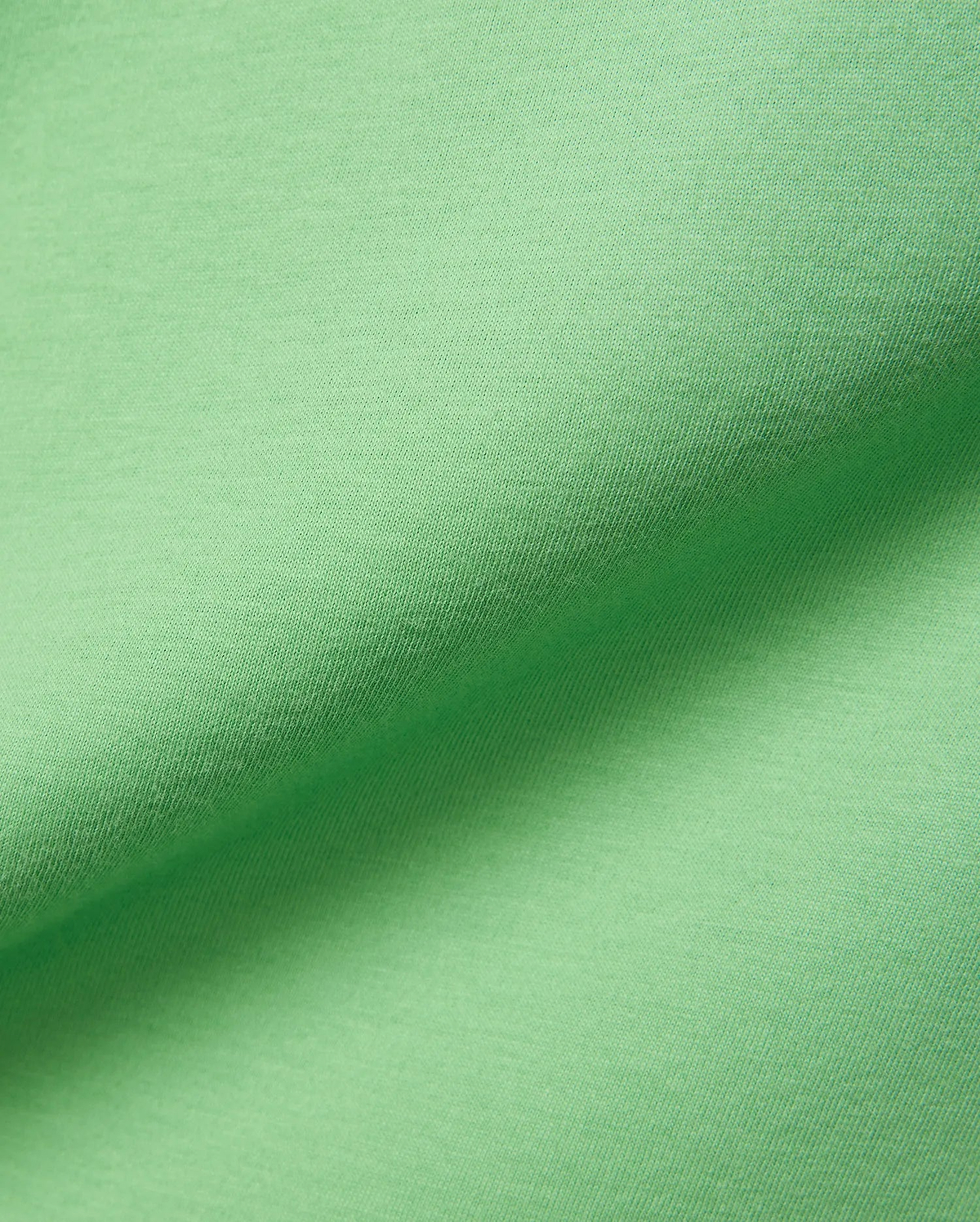 Psycho Bunny Mens Classic Crew Neck Tee in vibrant lime green, crafted from premium, ultra-soft jersey knit fabric, showcasing subtle texture and elegant folds.