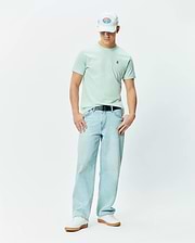 Mens Classic Crew Neck Tee in mint green, featuring a classic fit and soft jersey texture. Small embroidered blue, white, and black Psycho Bunny skull logo on the left chest.