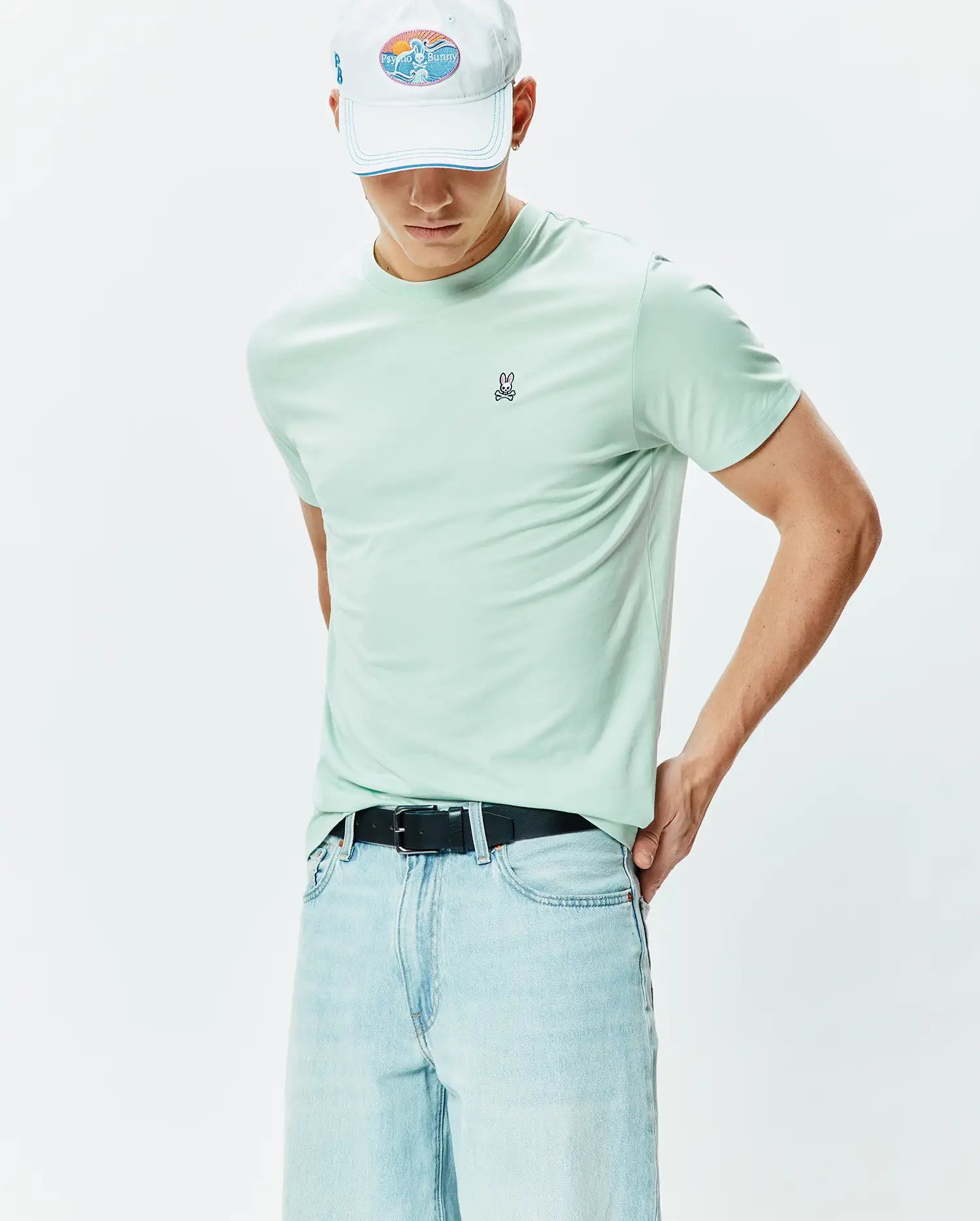 Mens Classic Crew Neck Tee in mint green, featuring a smooth jersey knit and a classic fit, with a small embroidered black and white Psycho Bunny skull logo on the left chest.