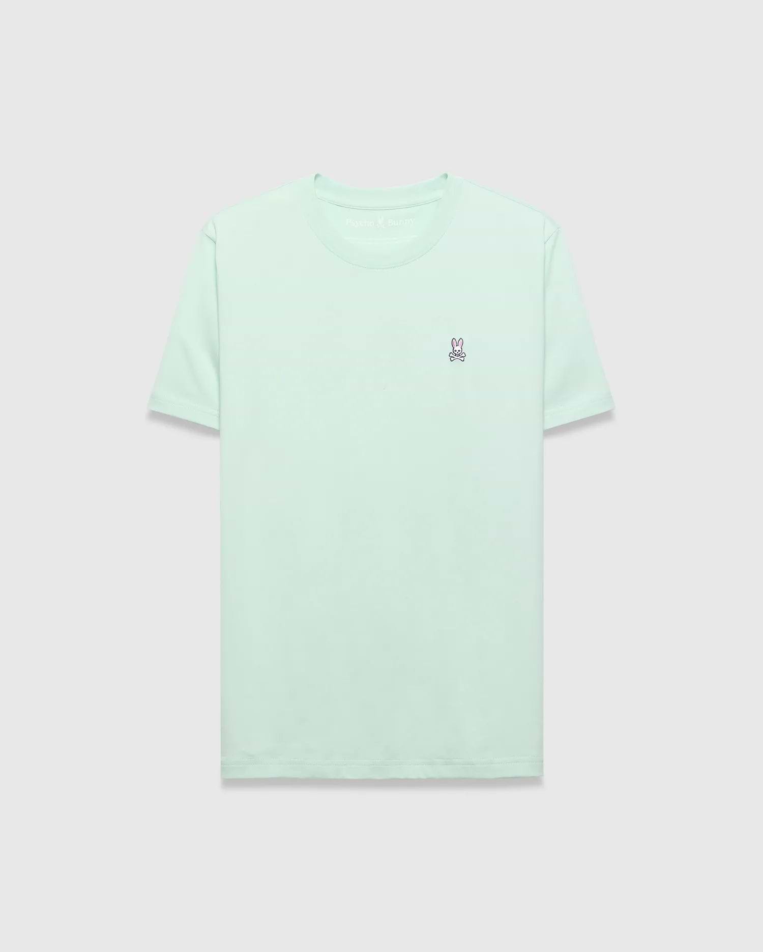 Mens Classic Crew Neck Tee in mint green, featuring a classic fit and soft jersey fabric. A small, embroidered pink and purple Psycho Bunny skull logo is on the left chest.