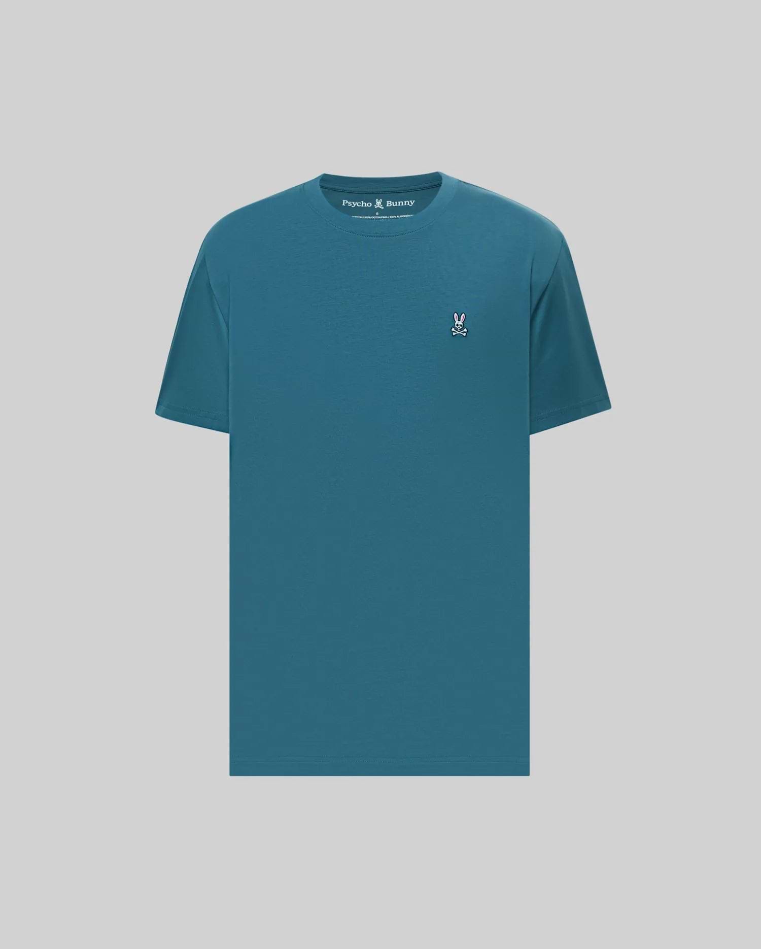 Mens Classic Crew Neck Tee in teal, featuring a classic fit and smooth jersey knit. Small embroidered Psycho Bunny skull logo in pink, white, and black on the left chest.