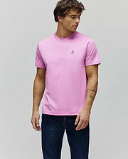 Mens Classic Crew Neck Tee in vibrant pink, featuring a classic fit and smooth jersey knit. A small, embroidered black and white Psycho Bunny skull logo is on the left chest.
