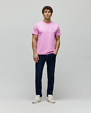 Mens Classic Crew Neck Tee in vibrant pink, featuring a classic fit and smooth jersey knit. Small, multi-color embroidered Psycho Bunny skull logo on the left chest.