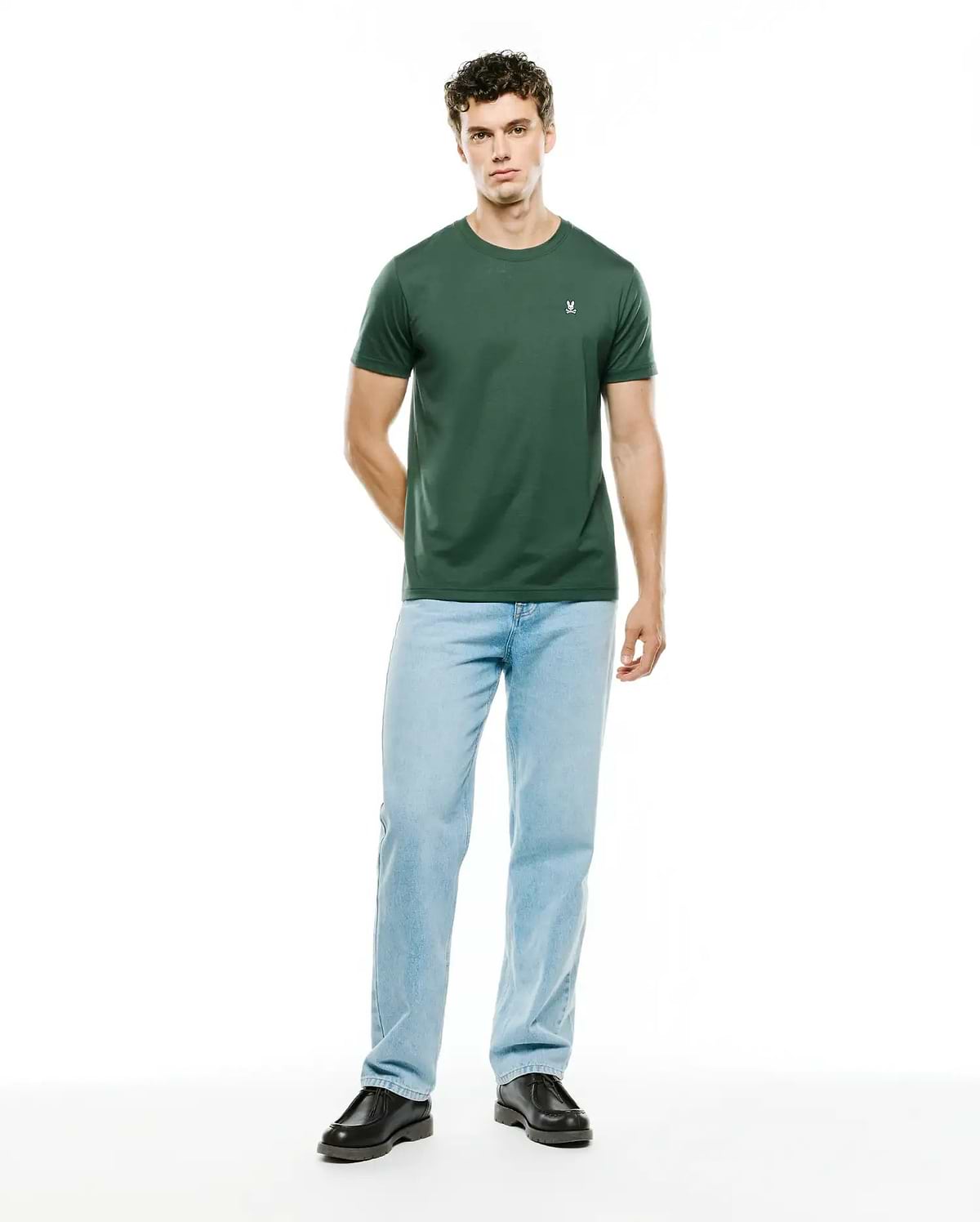 Mens Classic Crew Neck Tee in dark green, featuring a smooth jersey knit fabric and a small white embroidered Psycho Bunny skull logo on the left chest, offering a classic fit.