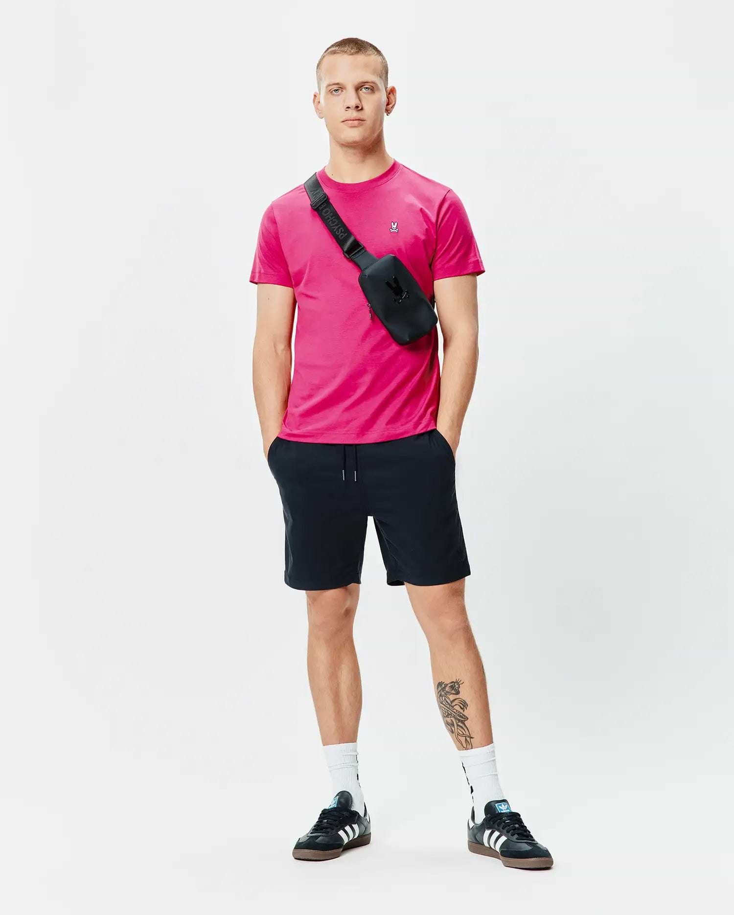 Mens Classic Crew Neck Tee in vibrant fuchsia, featuring a classic fit and soft jersey fabric, with a small embroidered Psycho Bunny skull logo on the left chest.
