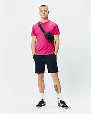 Mens Classic Crew Neck Tee in vibrant fuchsia, featuring a classic fit and soft jersey fabric, with a small embroidered Psycho Bunny skull logo on the left chest.
