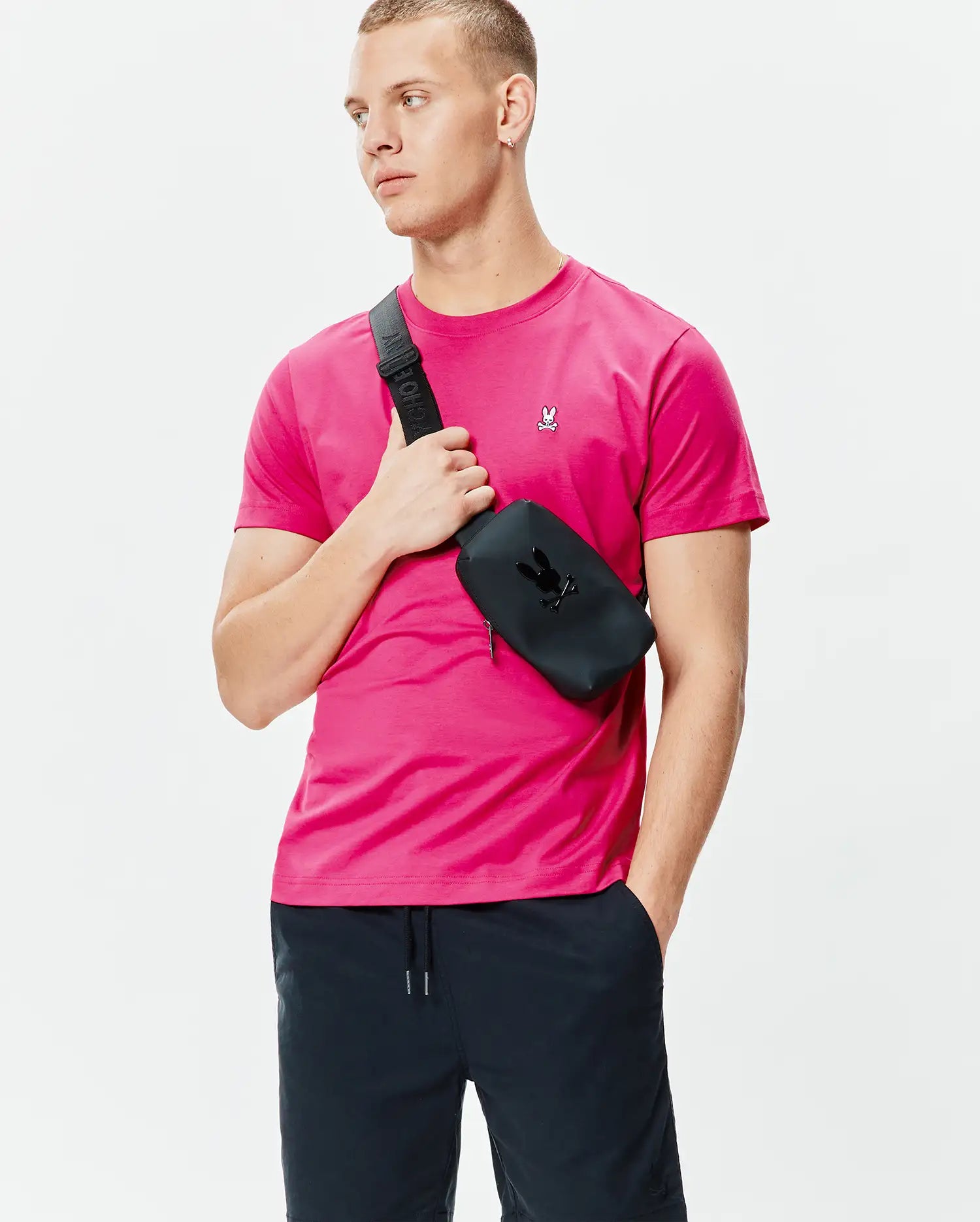 Mens Classic Crew Neck Tee in hot pink, featuring a smooth jersey knit and a classic fit, with a small embroidered white and black Psycho Bunny skull logo on the left chest.