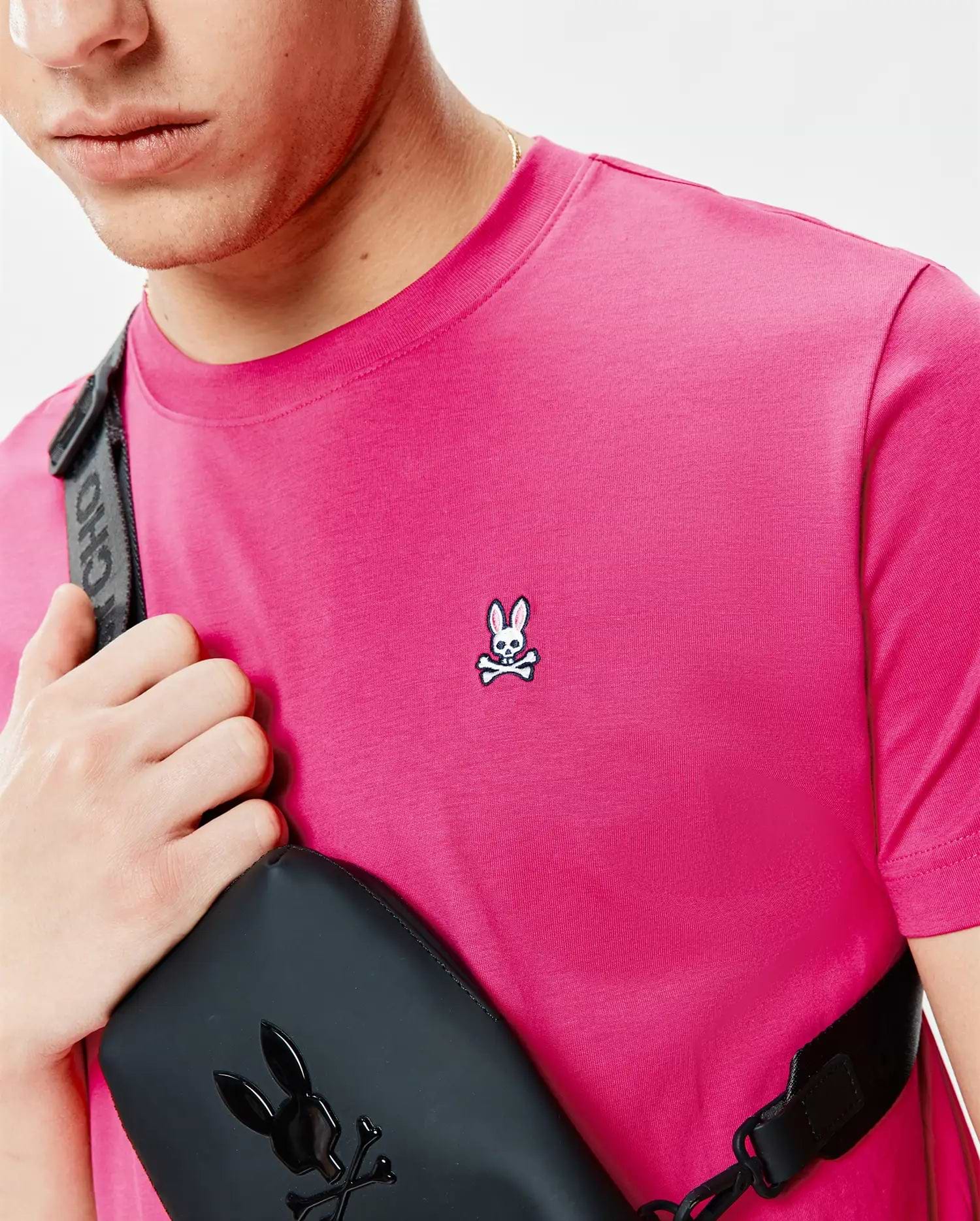 Mens Classic Crew Neck Tee in vibrant pink jersey knit, featuring a classic fit and a small embroidered Psycho Bunny skull logo on the left chest.