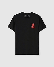 The Psycho Bunny MENS NEW YORK TEE - B6U554W1PC is a stylish black tee crafted from soft Pima cotton. It features a small red bunny logo with X-shaped eyes on the left chest, along with "NY" above crossed bones for a distinctive look.