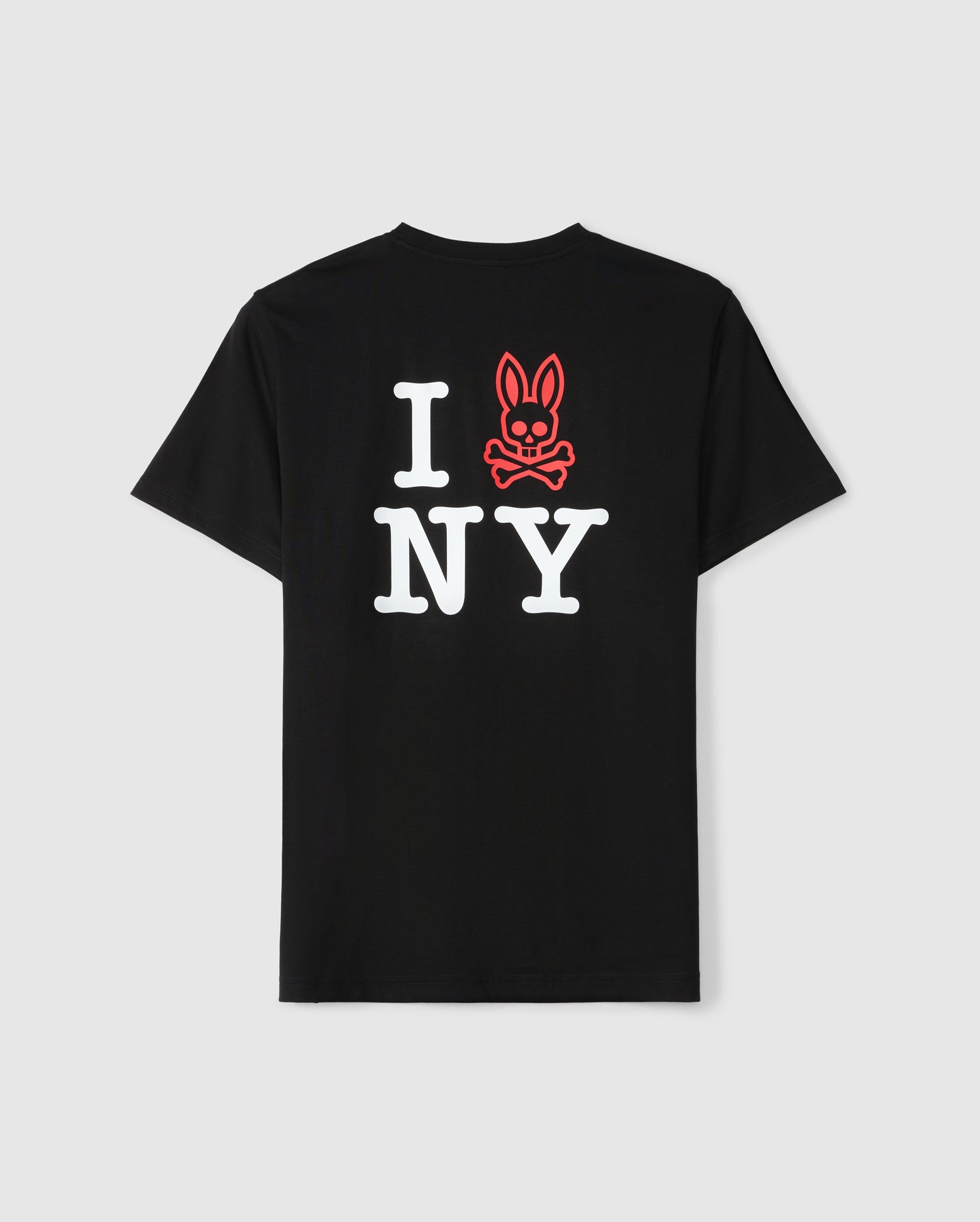The Psycho Bunny MENS NEW YORK TEE - B6U554W1PC showcases a unique design where the text "I NY" is displayed in bold, white letters on the back of a black tee. The "I" is creatively replaced with an outlined red bunny head featuring a skull and crossbones motif. Constructed from premium Pima cotton, this tee offers a plain white background for added contrast.