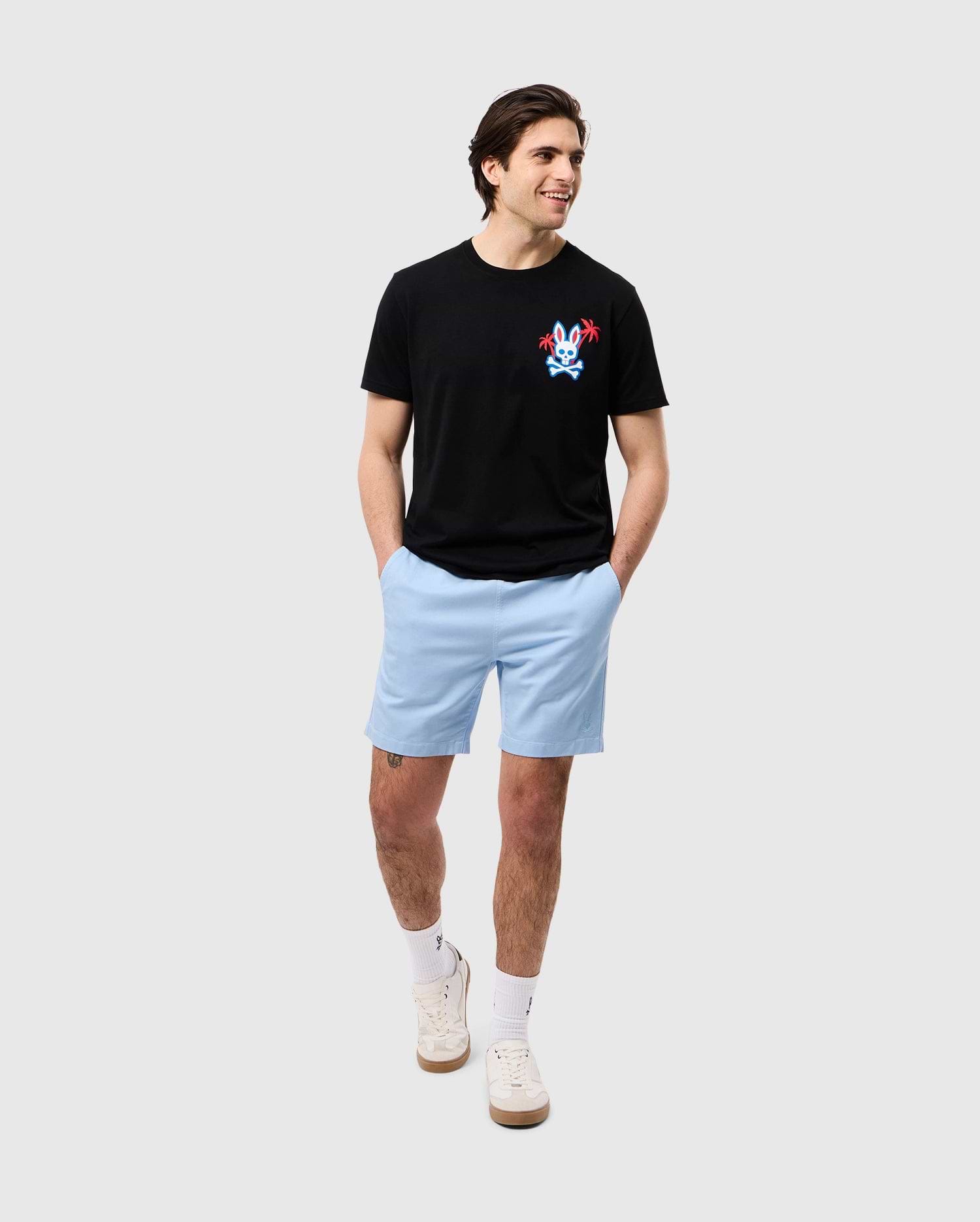 head to toe view of a model wearing the pima cotton los angeles city tee