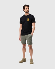 Head to toe view of a model wearing the pima cotton las vegas city tee