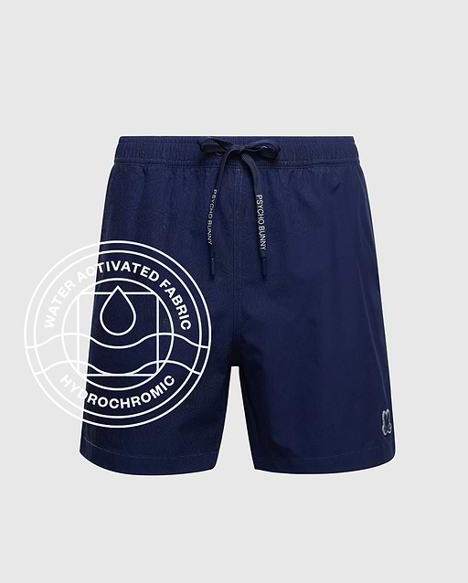 The Psycho Bunny MENS BIG AND TALL SAMOS HYDROCHROMIC SWIM TRUNK (B9W453F200) features a navy blue drawstring waist, comfy mesh lining, and innovative Hydrochromic fabric that changes when wet. Water droplet icon shown.