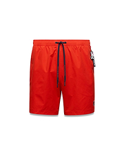 Mens Samos Hydrochromic Printed Swim Trunk in vibrant red, classic fit, smooth fabric, navy drawstring with Psycho Bunny text, small embroidered bunny skull logo, and a Psycho Bunny keychain.