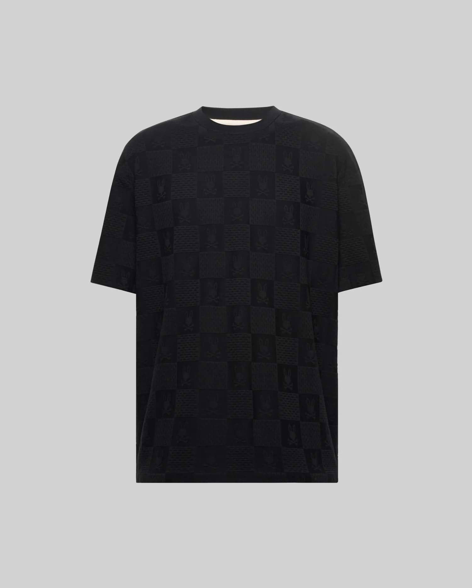 Mens Big And Tall Dustin Oversized Fit Tee, a black jacquard knit t-shirt featuring an all-over tonal checkerboard pattern with alternating Psycho Bunny skull logos and textured squares.