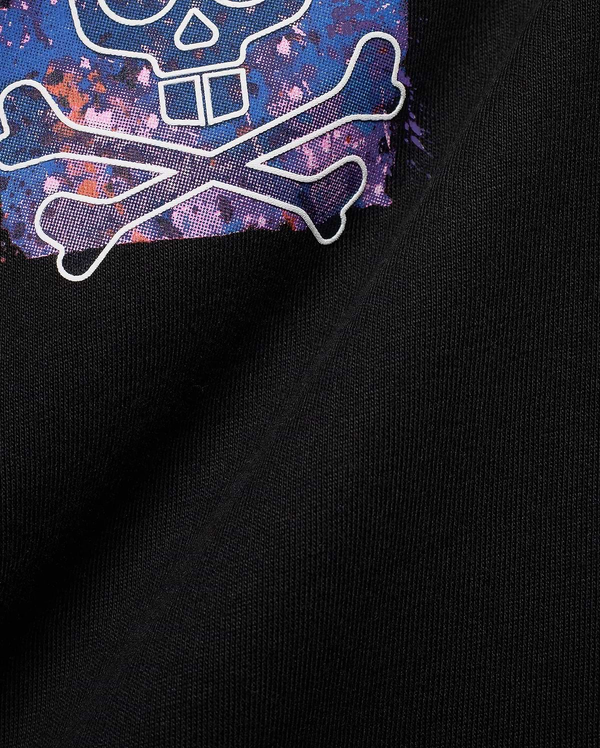 Black jersey Mens Big And Tall Isaac Splatter Back Graphic Tee featuring a large, vibrant blue, purple, pink, and orange splatter skull and crossbones graphic outlined in white.