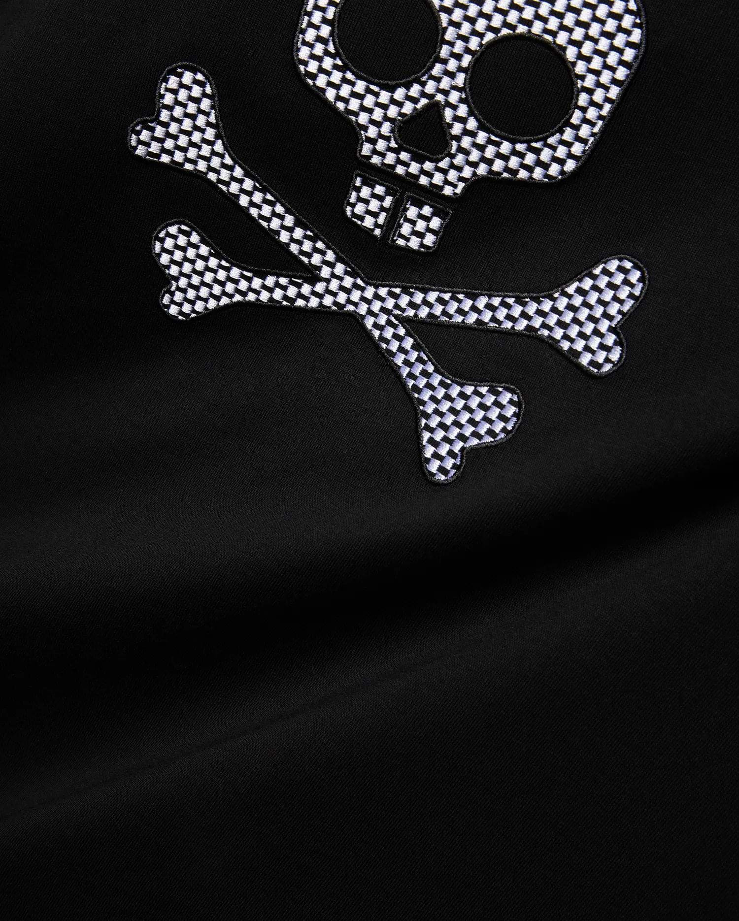 Mens Big And Tall Stan Graphic Tee featuring a black jersey fabric with a large, embroidered white and black checkered skull and crossbones graphic on the chest, offering a relaxed fit.