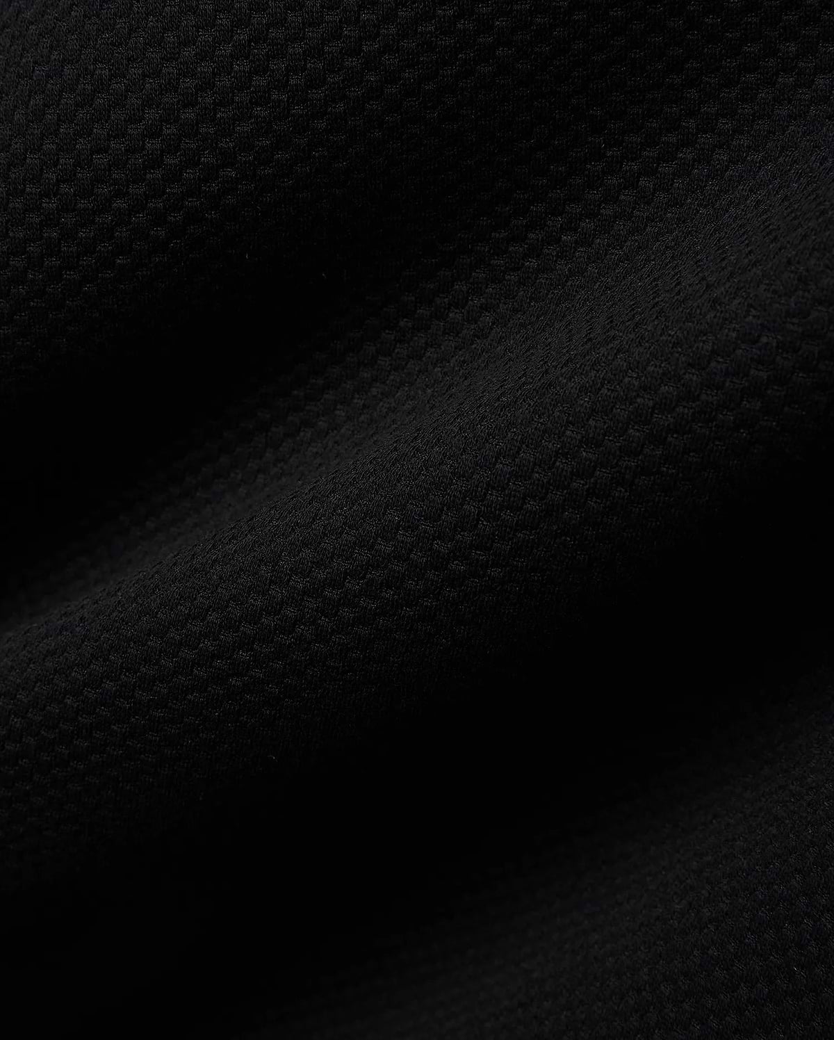 Mens Big And Tall Marc Textured 1/4 Zip in rich black, featuring a luxurious, finely detailed geometric pique knit fabric, embodying Psycho Bunny's refined streetwear aesthetic.