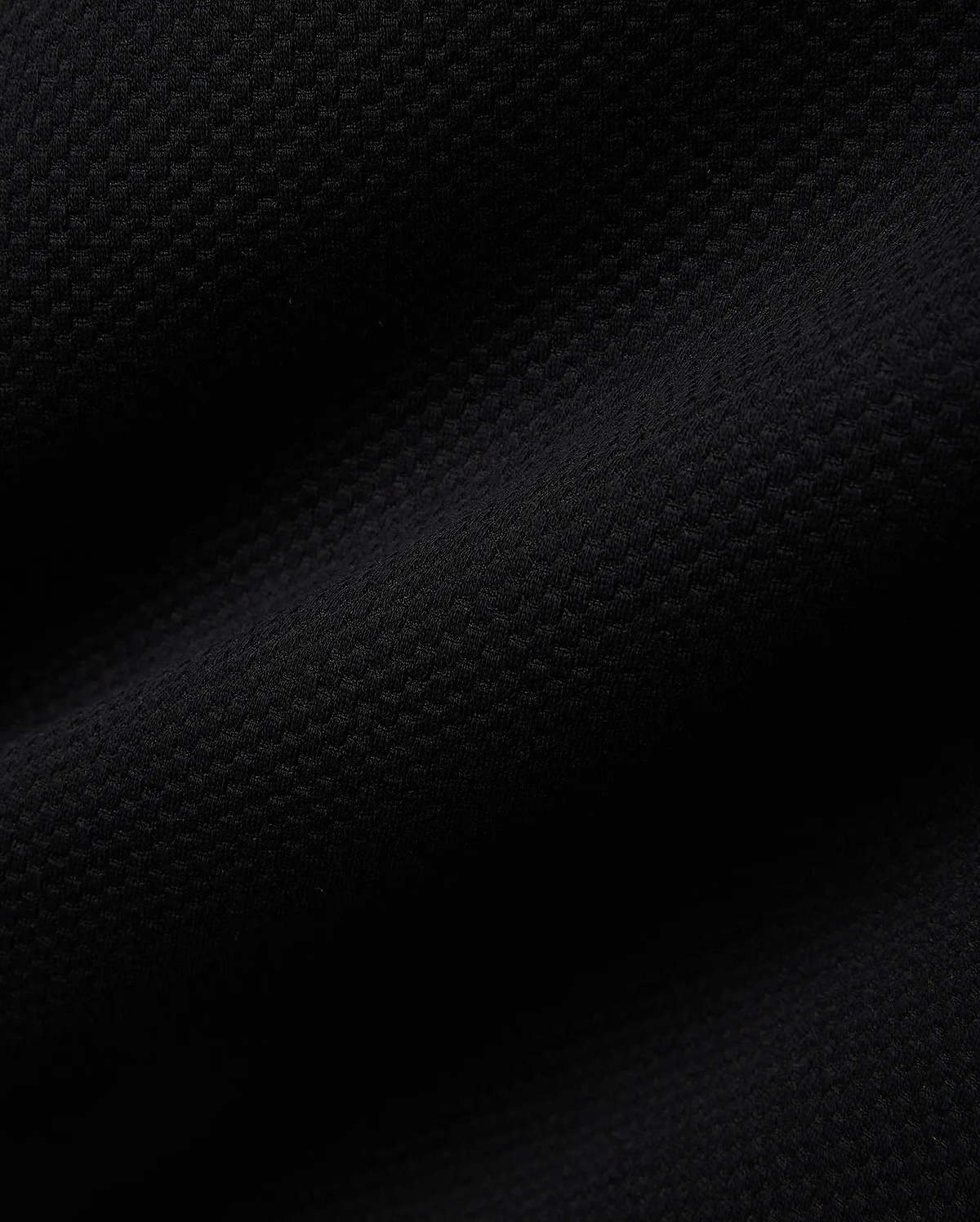 Mens Big And Tall Marc Textured 1/4 Zip in rich black, featuring a luxurious, finely detailed geometric pique knit fabric, embodying Psycho Bunny's refined streetwear aesthetic.