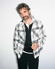 Mens Kessler Relaxed Plaid Overshirt in white, black, and grey textured plaid, featuring a full-zip front, classic collar, and small Psycho Bunny logo on the zipper pull.