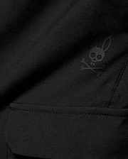 Kids Luka Cargo Pant in black woven fabric, featuring a tonal black Psycho Bunny skull and crossbones logo on the cargo pocket.