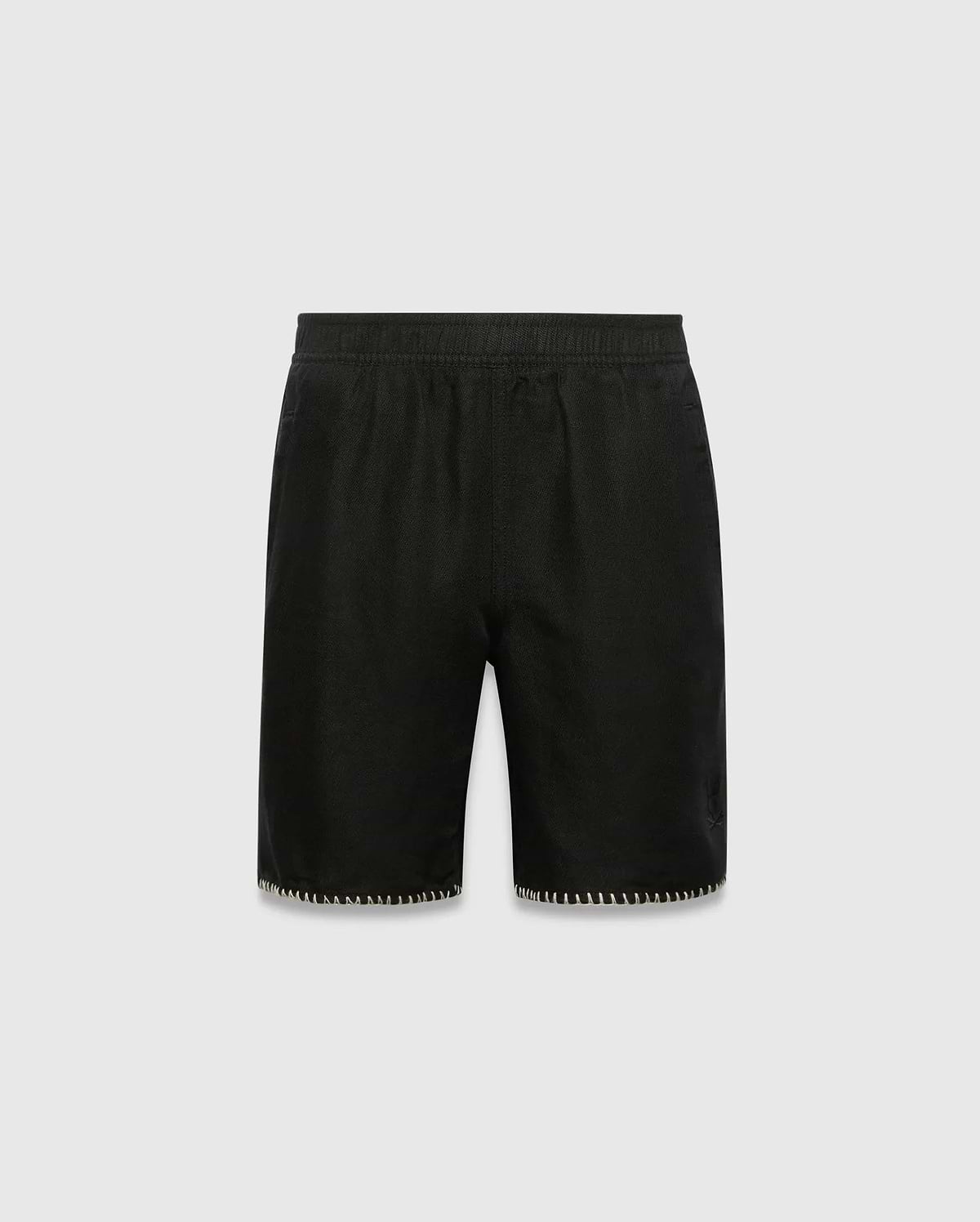 Kids Brad Linen Short, black relaxed fit with linen texture, featuring a subtle tonal embroidered Psycho Bunny skull logo on the lower right leg and white contrast blanket stitching on the hem.