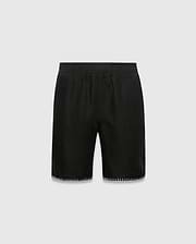 Kids Brad Linen Short, black relaxed fit with linen texture, featuring a subtle tonal embroidered Psycho Bunny skull logo on the lower right leg and white contrast blanket stitching on the hem.