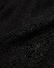 Kids Brad Linen Short in classic black, crafted from a breathable linen blend with a subtle woven texture, featuring a small, tonal embroidered Psycho Bunny skull logo.