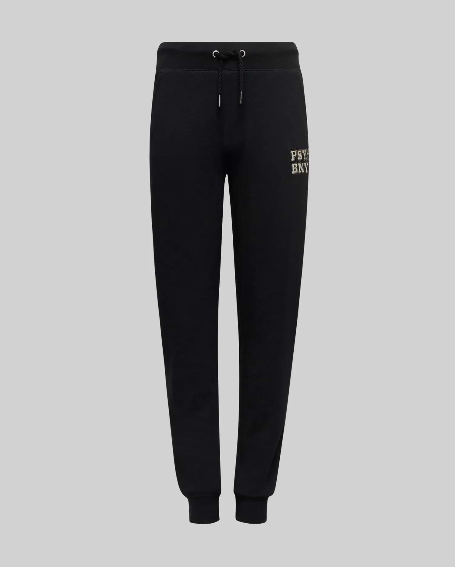 The Psycho Bunny KIDS WADE SWEATPANT (KB0800002) features black jogger pants with an elastic waistband, drawstrings, cuffed ankles, and a small beige embroidered wordmark on the upper left thigh, made from a premium cotton blend.