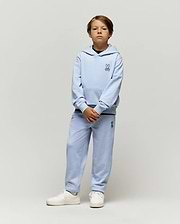 Light blue Kids Timothy 4k Bunny Jogger set, featuring a relaxed fit French terry hoodie with kangaroo pocket and matching joggers, both with small embroidered black Psycho Bunny skull logos.