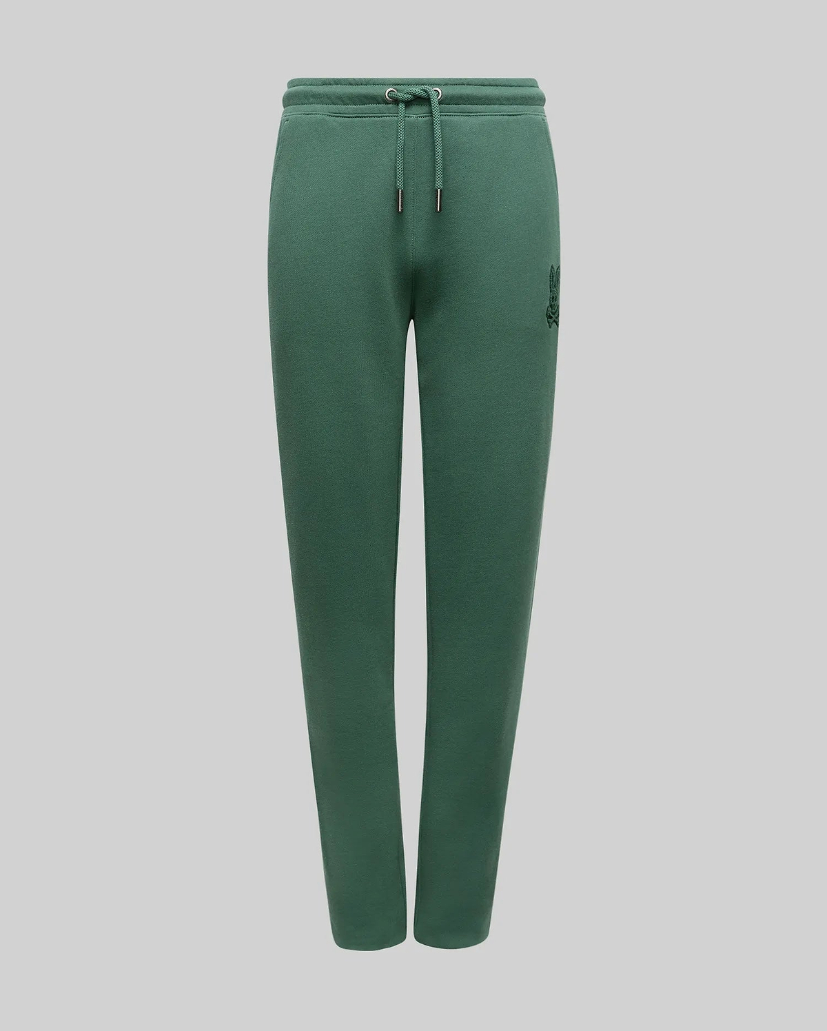 Kids Tate Chenille Sweatpant in deep forest green, featuring a relaxed fit, soft chenille fabric, an adjustable drawstring waist, and a small, tonal embroidered Psycho Bunny skull logo on the upper left thigh.