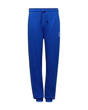 KIDS NATHANIEL SWEATPANT. Relaxed fit royal blue soft jersey sweatpants with a drawstring waist, ribbed cuffs, and a small embroidered light blue Psycho Bunny skull logo on the left thigh.