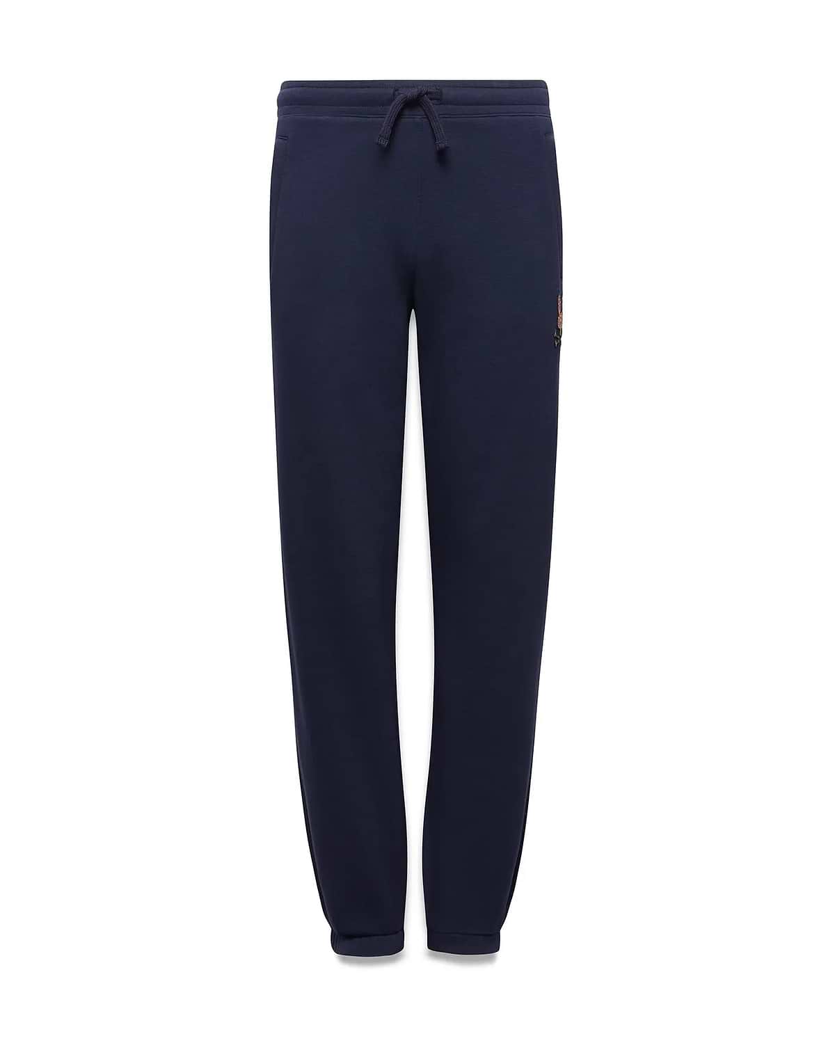 Kids Darcy Sweatpant in navy, featuring a relaxed fit, smooth jersey knit, drawstring waist, and a small, multi-color embroidered Psycho Bunny skull logo on the upper right thigh.