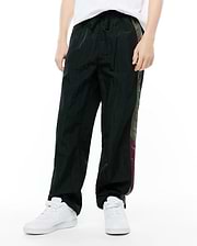 Kids Alder Nylon Colorblock Pant, dark green, featuring a relaxed fit, crinkled nylon texture, and bold side colorblock panels in olive green and purple.