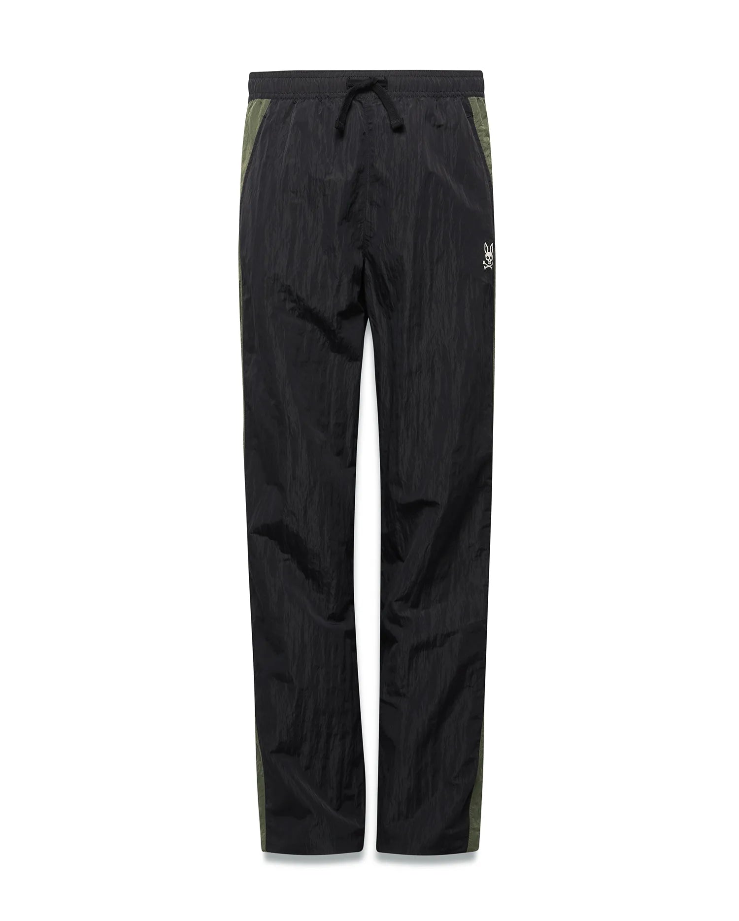 Kids Alder Nylon Colorblock Pant in black crinkled nylon with olive green side panels, featuring a relaxed fit and a small white Psycho Bunny skull logo on the right hip.