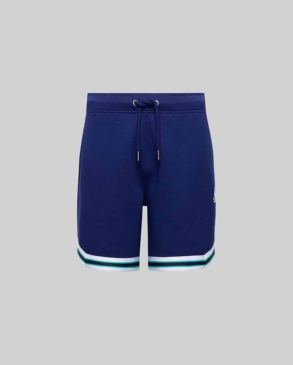 Psycho Bunny KIDS BASIL TAPED SHORT (KB0900003) in navy blue, made from a soft cotton-modal blend with a drawstring waist and white and teal hem stripes, shown on a plain gray background.