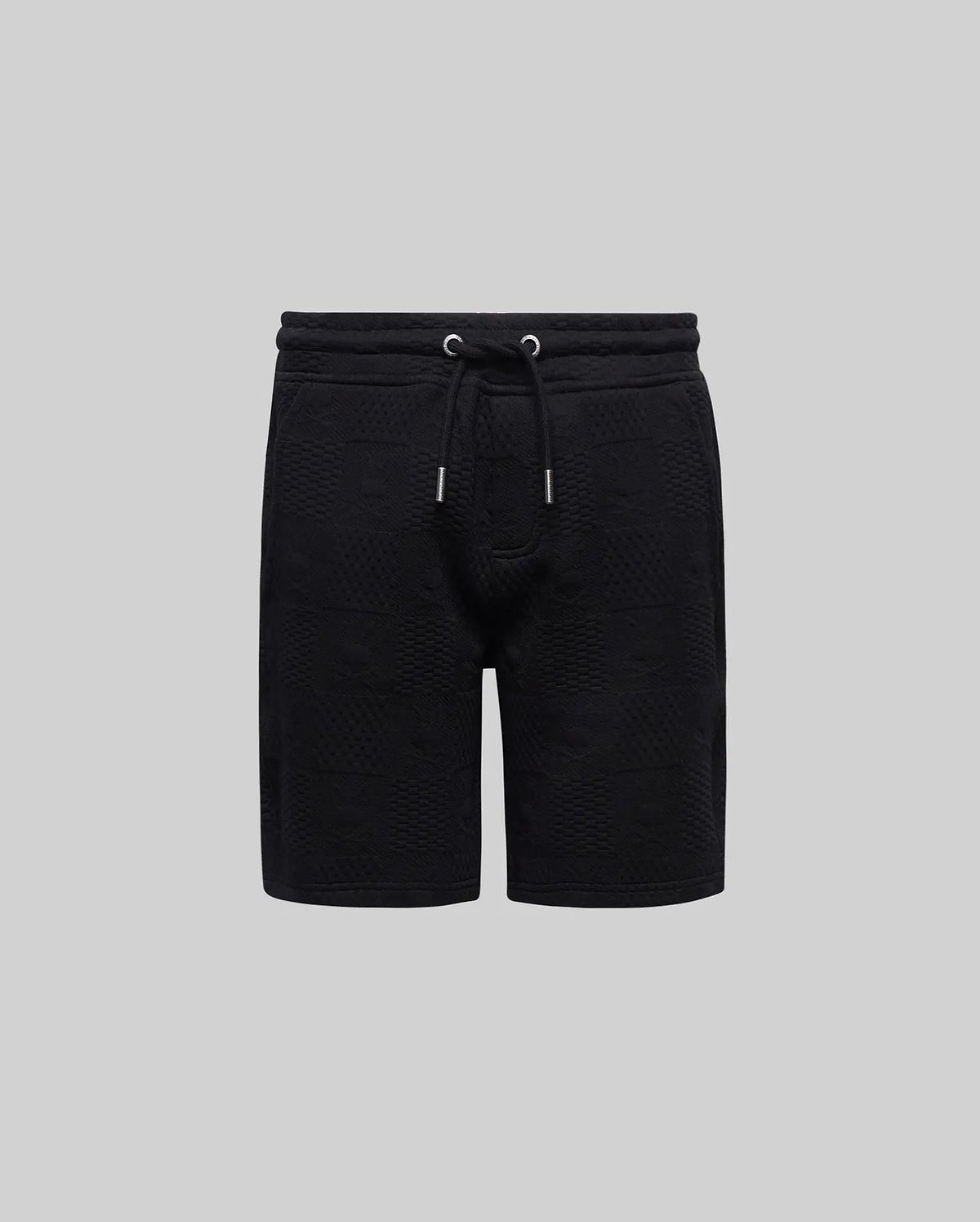 Kids Dustin Sweatshort, a black relaxed fit french terry short featuring an all-over embossed checkerboard pattern and an adjustable drawstring waist with silver tips, from Psycho Bunny.