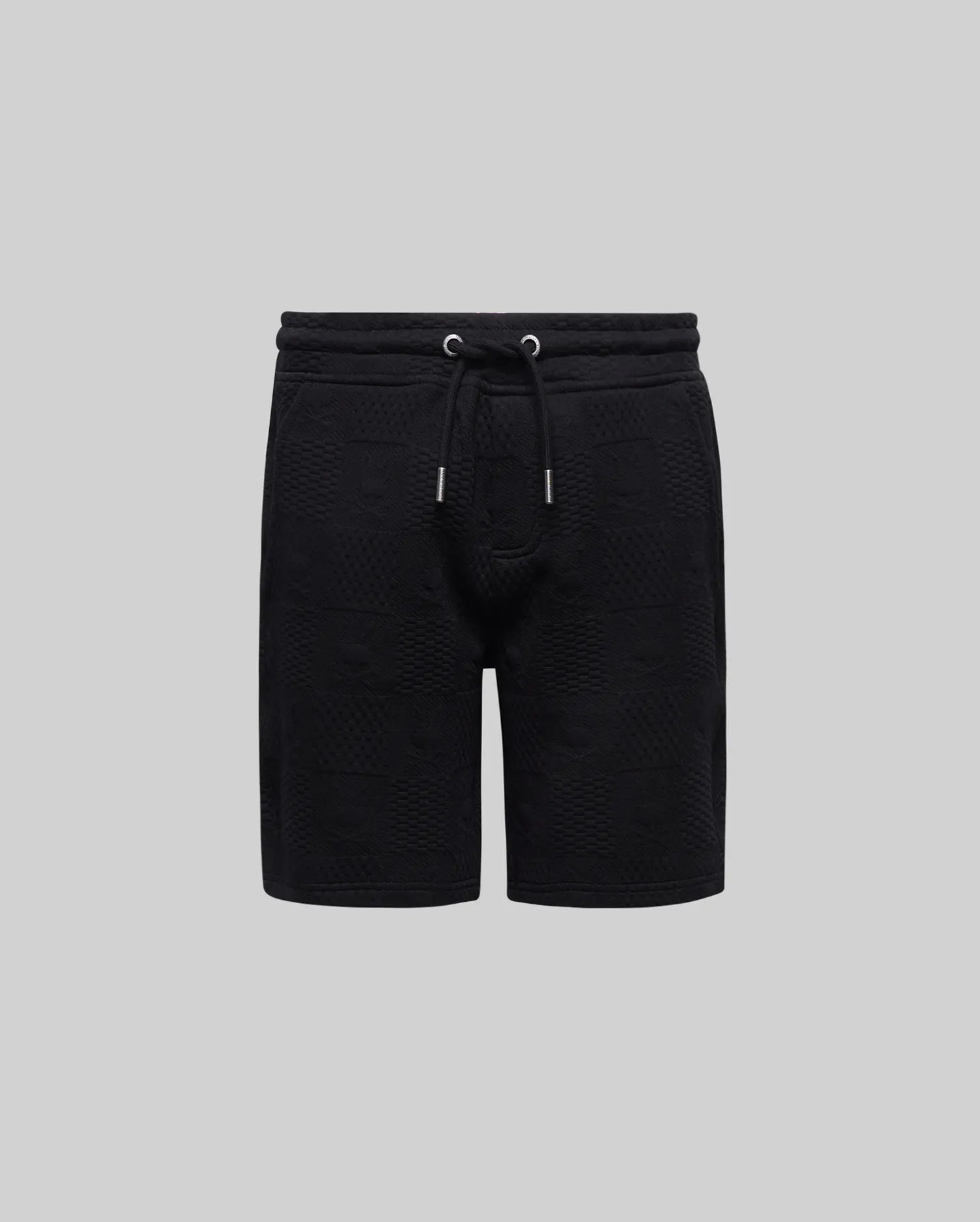 Kids Dustin Sweatshort, a black relaxed fit french terry short featuring an all-over embossed checkerboard pattern and an adjustable drawstring waist with silver tips, from Psycho Bunny.