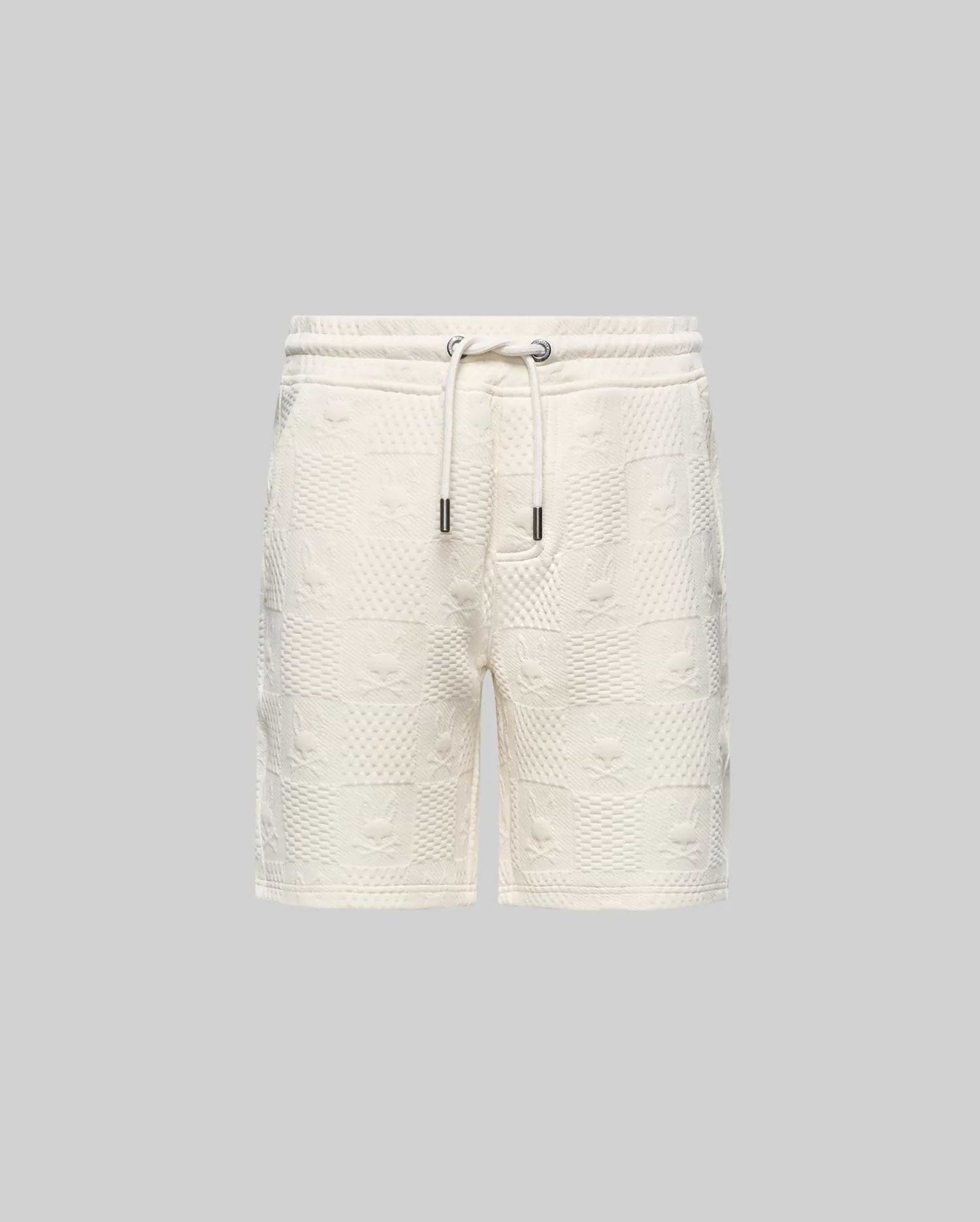 Kids Dustin Sweatshort, cream, relaxed fit, with an all-over embossed checkerboard pattern featuring alternating Psycho Bunny skull logos and textured squares, plus a drawstring waist.