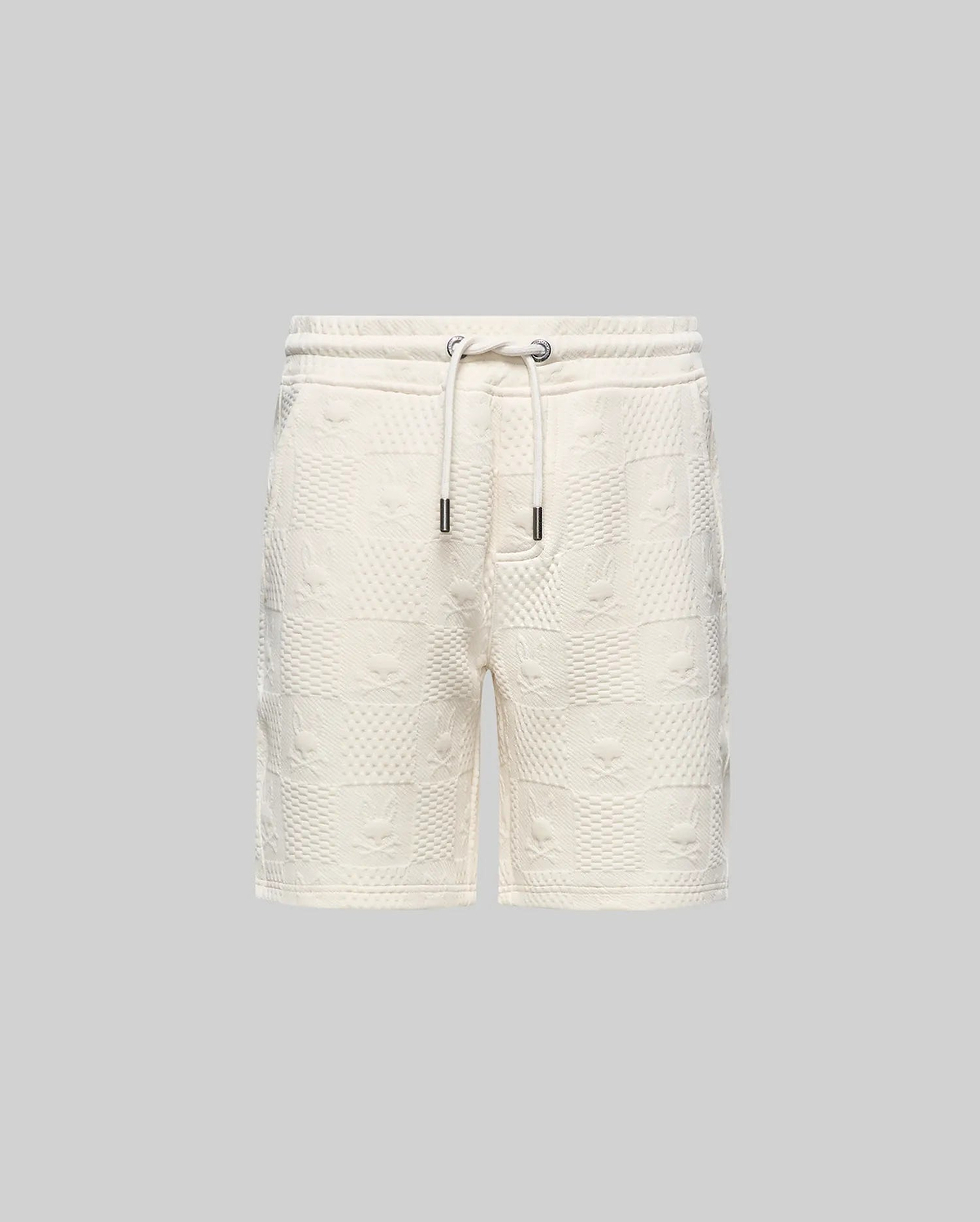 Kids Dustin Sweatshort, cream, relaxed fit, with an all-over embossed checkerboard pattern featuring alternating Psycho Bunny skull logos and textured squares, plus a drawstring waist.